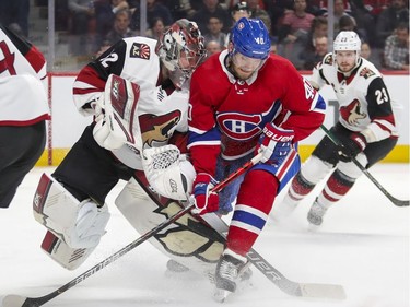 Montreal Canadiens Joel Armia collides with Arizona Coyotes goalie Antti Raanta during first period of National Hockey League game in Montreal Monday February 10, 2020.