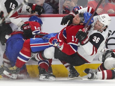Montreal Canadiens Ilya Kovalchuk is dragged to the ice by Arizona Coyotes Christian Fischer during a scrum in the first period of National Hockey League game in Montreal Monday February 10, 2020.