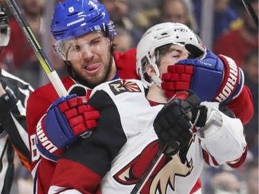 Montreal Canadiens Ben Chiarot grabs Arizona Coyotes Conor Garland around the face during second period scrum after the whistle in National Hockey League game in Montreal Monday February 10, 2020.