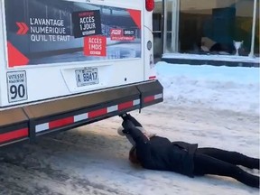 A video posted to Facebook and Instagram Saturday, Feb. 8, shows a young woman bus-surfing by hanging on to the back of a No. 24 bus. Police are investigating.