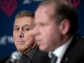 Alouettes co-owner Gary Stern, left, listens as newly appointed general manager Danny Maciocia, speaks at a news conference in Montreal on Jan. 13, 2020.