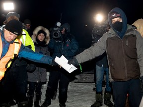 Blockade protesters were served an injunction at the Saint-Lambert rail blockade on Thursday February 20, 2020.