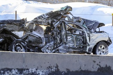 A crumpled car at the scene of a multi-car accident on Highway 15 West in Laprairie on Wednesday, Feb. 19, 2020.