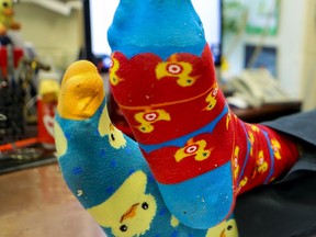 Joe Schwarcz wears colourful socks in his office at McGill University's Office for Science and Society in Montreal Tuesday February 18, 2020.