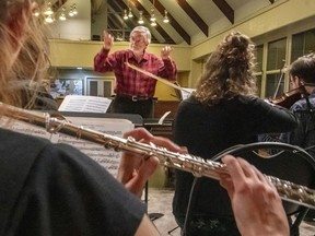 Stewart Grant and members of the Sinfonia de l'Ouest chamber orchestra rehearse for the concert From Pointe-Claire to Vienna.