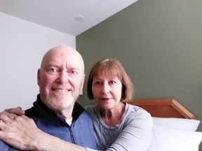 Bryan Doyle and Lucie Mauro in their 9-by-12-foot room on the third floor of the NAV Canada Training Centre on Wednesday in Cornwall, where they began a 14-day quarantine on Feb. 21.