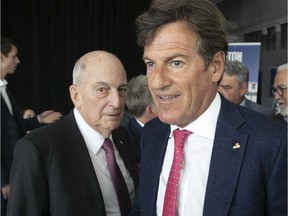 Stephen Bronfman (right) and his father, Charles, attend press conference celebrating the 50th anniversary of the Expos on May 21, 2019.