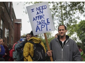 Demonstrators take part in a Montreal rally led by the Front d'action populaire en réaménagement urbain (FRAPRU) in June 2019.