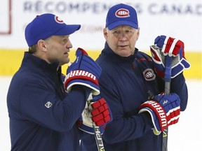 Montreal Canadiens head coach Claude Julien, right, speaks with associate coach Kirk Muller practice at the Bell Sports Complex in Brossard on Nov. 27, 2019.