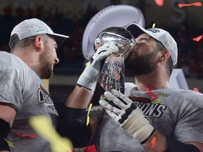 Laurent Duvernay-Tardif #76 of the Kansas City Chiefs celebrates with the Vince Lombardi Trophy after defeating the San Francisco 49ers 31-20 in Super Bowl LIV at Hard Rock Stadium on February 02, 2020 in Miami, Florida.
