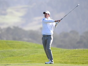 Nick Taylor of Canada plays a shot on the 14th hole during the final round of the AT&T Pebble Beach Pro-Am at Pebble Beach Golf Links on Sunday, Feb. 9, 2020, in Pebble Beach, Calif.