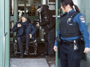 Former Montreal police officer and Greenfield Park minor league hockey coach François Lamarre left the Longueuil courthouse after his arraignment Dec. 19, 2019.