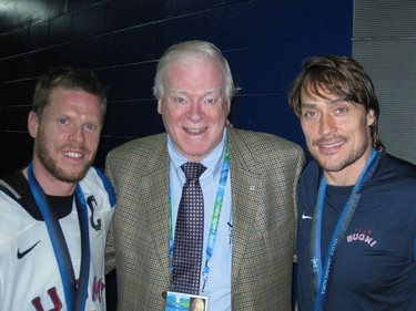 Dr. David Mulder (centre) poses with former Canadiens captain Saku Koivu (left) and fellow Finnish player Teemu Selanne at the Olympic Games.
