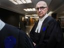 Veteran Montreal defence lawyer Ralph Mastromonaco wears a blue circle on his robe at the Montreal courthouse on Feb. 6, 2020.