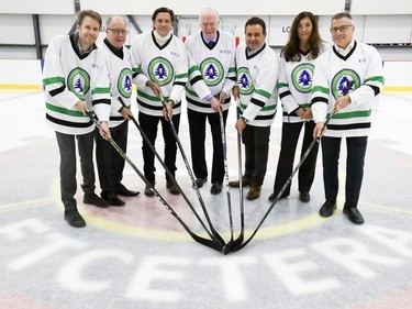 Dr. David Mulder, centre right, and former Montreal Canadien Patrice Brisebois with members of the organizing committee for the Cedars Hockey To Conquer Cancer hockey tournament, from left, Dr. Tarek Hijal, Steve Stotland, Dario Montoni, Ariel Dayan Médalsy and Tony Aksa, at Hockey Etcetera in Montreal on Jan. 29, 2020.