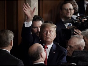 President Donald Trump waves after delivering his State of the Union address in the chamber of the US House of Representatives at the US Capitol Building on Feb.4, 2020 in Washington, DC.