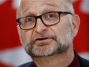 Justice Minister David Lametti is seen at press conference in Ottawa on Feb. 24, 2020.