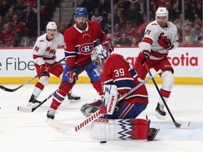 Canadiens goaltender Charlie Lindgren makes a save against the Carolina Hurricanes at Bell Centre in Montreal on Saturday, Feb. 29, 2020.