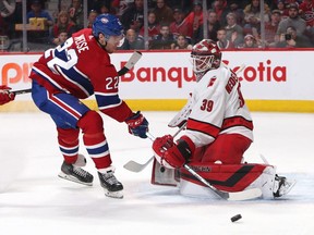 Carolina Hurricanes goaltender Alex Nedeljkovic makes a save against Canadiens' Dale Weise at Bell Centre on Saturday, Feb. 29, 2020, in Montreal.