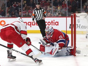 Canadiens goaltender Charlie Lindgren makes a save against Carolina Hurricanes' Andrei Svechnikov during the third period at the Bell Centre on Saturday, Feb. 29, 2020, in Montreal.