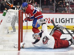Columbus Blue Jackets goalie Elvis Merzlikins  makes a save against Canadiens forward Brendan Gallagher at the Bell Centre on Sunday, Feb. 2, 2020.
