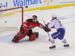 Montreal Canadiens' Ilya Kovalchuk scores the game winning goal on New Jersey Devils goaltender Louis Domingue in the shootout at Prudential Center in Newark on Feb. 4, 2020.