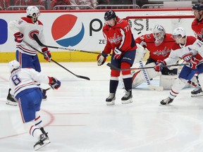 Canadiens defenseman Ben Chiarot scores a goal on Capitals goaltender Braden Holtby early in the third period at Capital One Arena in Washinton Thursday night.