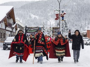 Wet'suwet'en Hereditary Chiefs from left, Rob Alfred, John Ridsdale, centre and Antoinette Austin, who oppose the Costal Gaslink pipeline take part in a rally in Smithers, B.C., Jan. 10, 2020.
