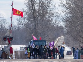 Supporters stand with protesters during a rail blockade in Tyendinaga Mohawk Territory, Ont., on Feb.17, 2020.