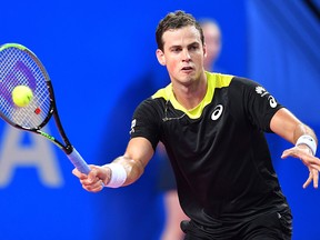 Canada's Vasek Pospisil returns the ball to France's Gael Montfils during the final at the Open Sud de France ATP World Tour in Montpellier, on February 9, 2020.