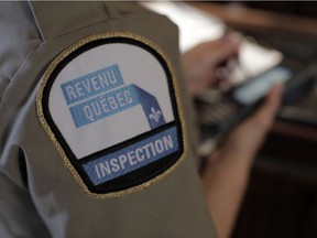 A Revenue Quebec inspector's patch. All bar and restaurant transactions are supposed to pass through a special box a "sales revenue module". (Revenue Quebec)
