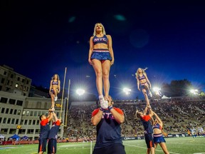 Alouettes cheerleaders perform during a game against the Winnipeg Blue Bombers on June 22, 2018.