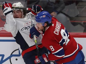Canadiens' Ben Chiarot checks Capitals' T.J. Oshie during game at the Bell Centre in January.