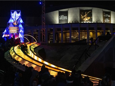 People participate in Nuit Blanche activities at the Quartier des Spectacles in Montreal on Saturday, Feb. 29, 2020.