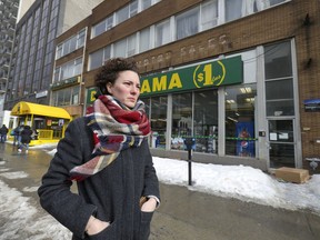 Maryse Chapdelaine, a project manager with the Peter-McGill Community Council, is seen Wednesday, March 4, 2020 in front of some buildings on Ste-Catherine St. W. that developer Peter Sergakis wants to demolish for a 15-storey residential project.
