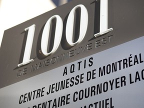 Signage outside the de Maisonneuve Blvd. offices in Montreal of youth-protection agency Direction de la protection de la jeunesse (DPJ).