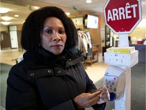 "People should understand that proper hand hygiene and respiratory etiquette is a way to protect their loved ones," says Dr. Willine Rozefort, assistant to the director of professional services at the CIUSSS Ouest-de-l'Île. Above: Rozefort washes her hands before entering the CHSLD LaSalle, in Montreal on Thursday, March 12, 2020.