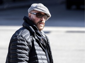 Georgi Spitzer leaves the Montreal courthouse after his acquittal.