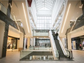 A deserted Eaton Centre on Friday March 13, 2020. Fear of the COVID-19 is keeping shoppers away. (Pierre Obendrauf / MONTREAL GAZETTE) ORG XMIT: 64096 - 0387