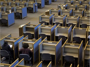 Students work in the library at Dawson College in Montreal in 2015.