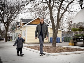 Montreal Impact goalkeeper Evan Bush walks with his son Canaan after having ice cream on May 2, 2019.