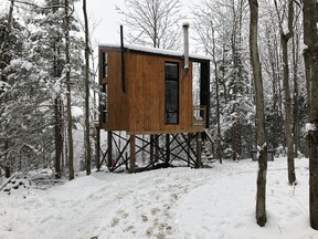 The dwellings of Laõ Cabines de Racine are perched high on a hill for dramatic views of Eastern Townships mountains and valleys.