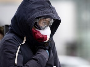 A woman arrives at a new COVID-19 testing site in Montreal on March 23, 2020.