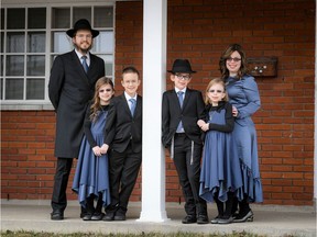 Rabbi Leibel Fine, from left, Mushka Fine, Yosef Yitzchak Fine, Menachem Mendel Fine, Chienna Fine, Chana Fine. Ryan Blau/PBL Photo