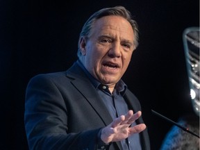 "If in the week before Christmas you have symptoms, you must stay home," Premier François Legault said.