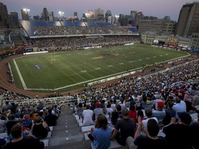 Fans watch the Montreal Alouettes take on the Hamilton Tiger-Cats at Molson Stadium on July 4, 2019.