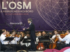 OSM music director Kent Nagano conducts the orchestra at a concert in the Montreal borough of Pierrefonds-Roxboro after spring flooding in June 2017.