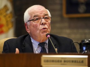 Beaconsfield Mayor Georges Bourelle responds during question period at city council meeting on Oct. 22, 2018.