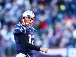 Tom Brady #12 of the New England Patriots reacts during the second quarter of a game against the New York Jets at Gillette Stadium on December 30, 2018 in Foxborough, Massachusetts.