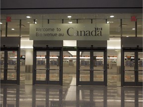 Pearson Airport's new Terminal 1 is pictured in Toronto Thursday, November 30, 2006. For Toronto Story by Peter Kuitenbrouwer Staff Photo: Brent Foster/National Post ADD: sign says Welcome to Canada - Canadian Customs and Immigration  /pws  // na111914-Refugees-Welfare //1109 na border ORG XMIT: POS2013022216575367  // 0116 na immig hfx ORG XMIT: POS1511070713030661